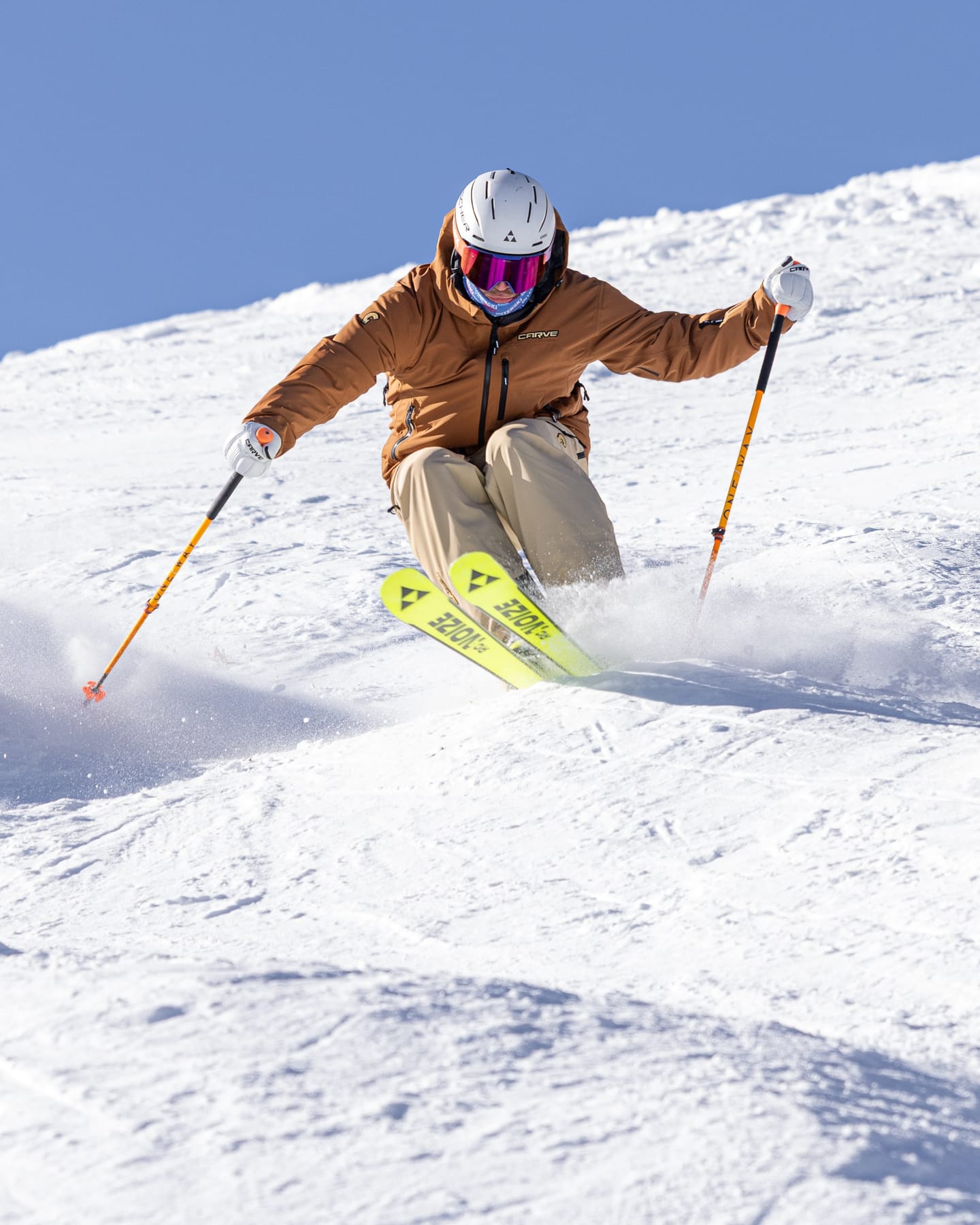 Tomas Mical skiing moguls towards the camera